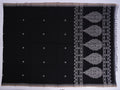 black Phulia saree with floral motifs